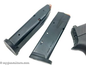 The Sig P320 ships with steel magazines which drop freely using the magazine release.