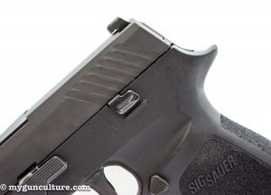 The standard Sig P320 has no manual safety lever, just this slide release lever n both sides of the frame.