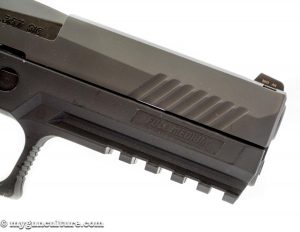 If you're into press checks, the Sig P320 has forward cocking serrations.